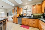 Fully equipped gourmet kitchen, granite counter tops